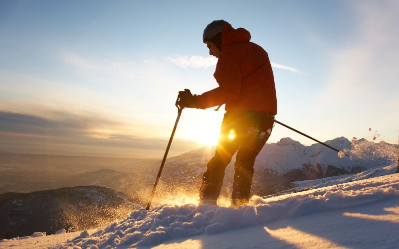 Colorado skier descending fresh snowpack at Wolf Creek