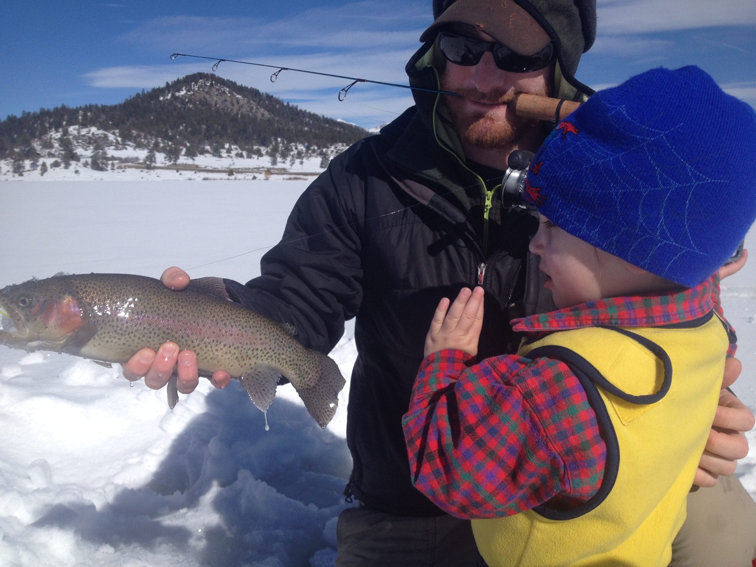 Happy angler with catch — Pagosa Springs fishing