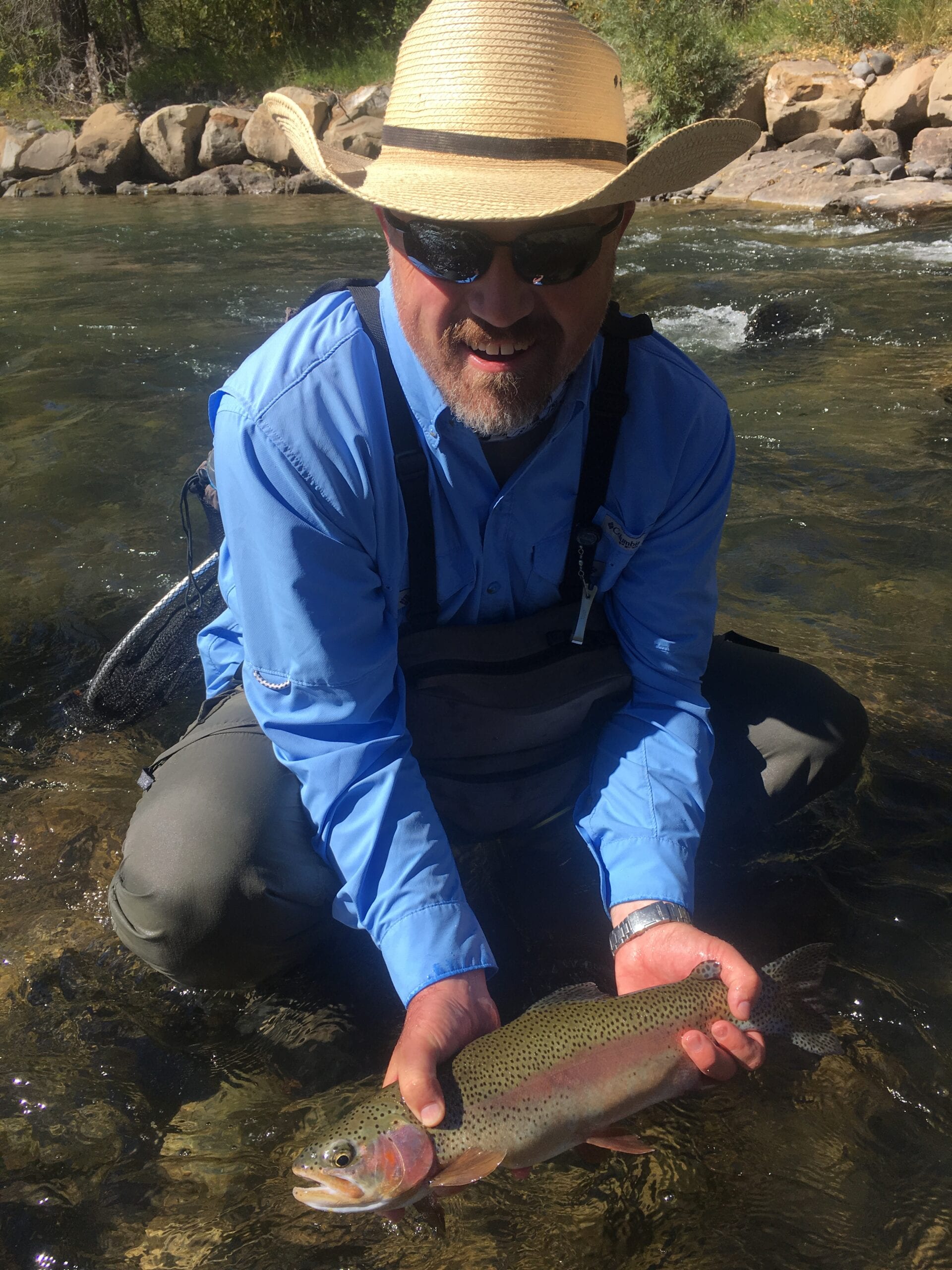 Fly fishing guide with angler on the San Juan River Pagosa Springs Colorado